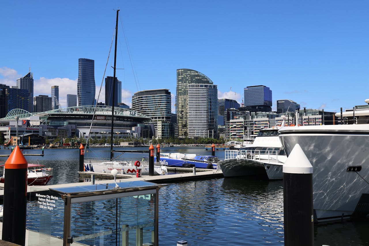 Captivating view of Melbourne's urban skyline and marina showcasing yachts and modern architecture.